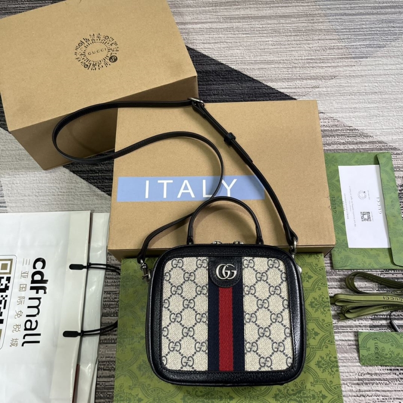 G*u*i top handle bags